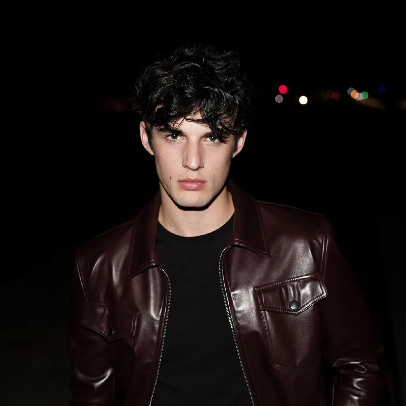 Man wearing Buneri burgundy leather jacket