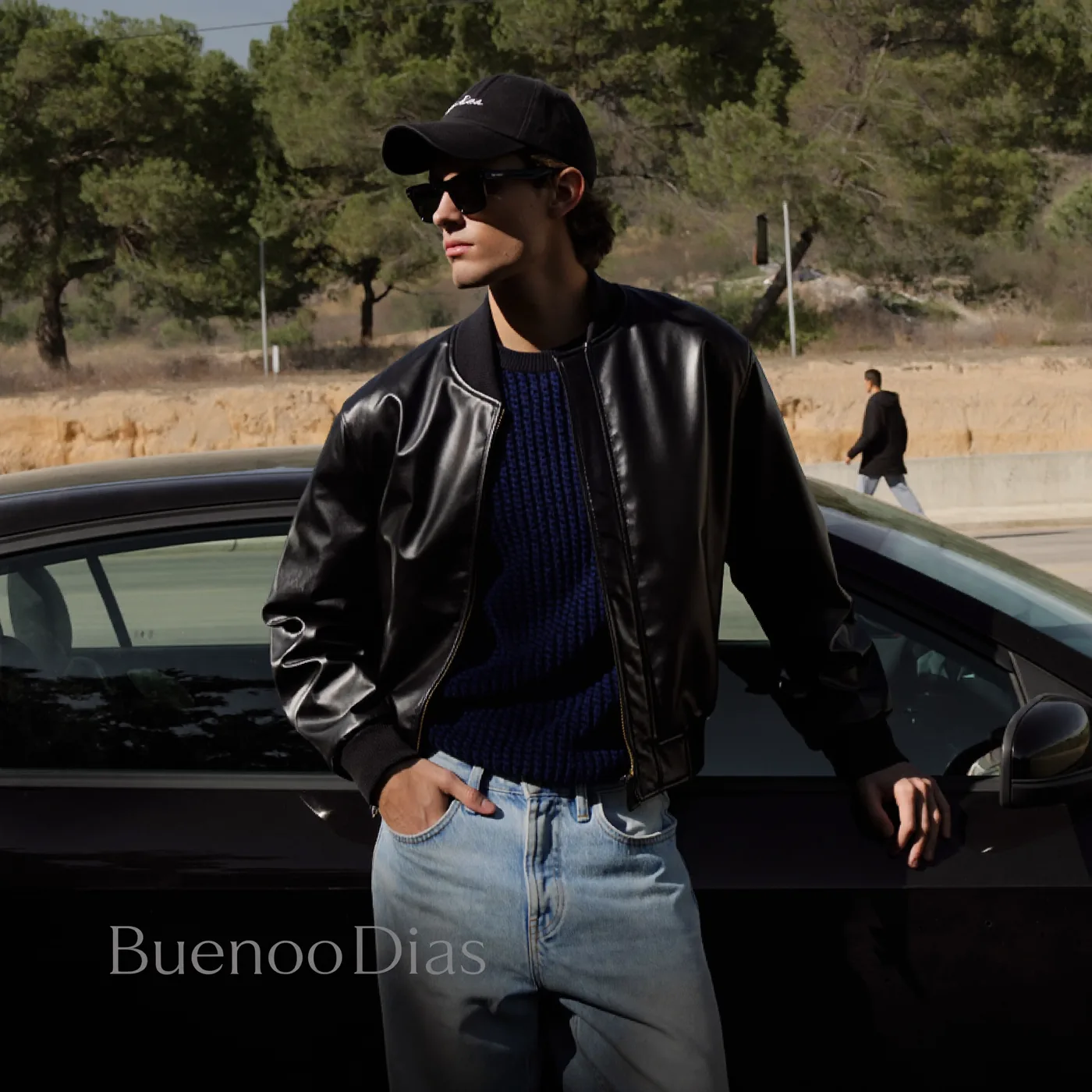 Man wearing Buneri black leather bomber jacket