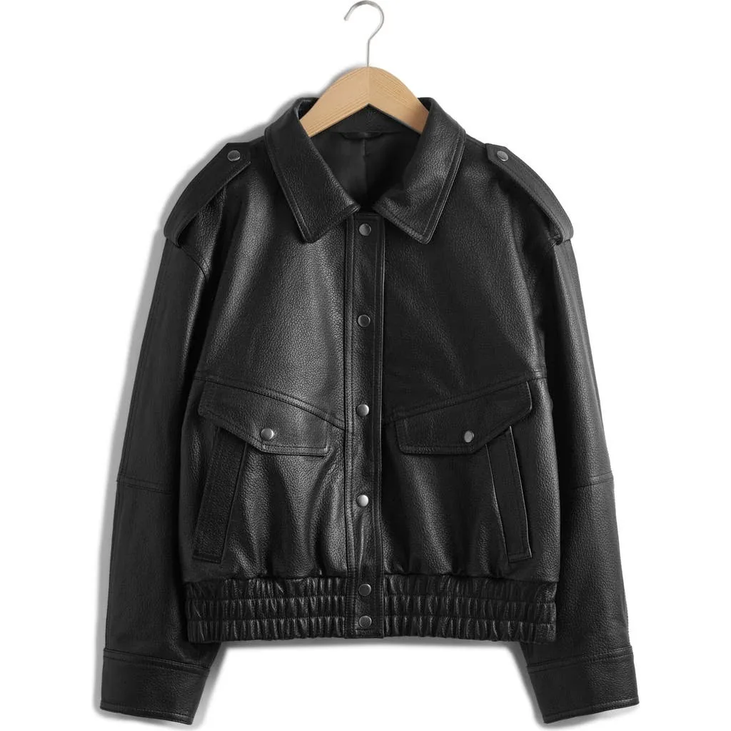 Man wearing Buneri black leather bomber jacket