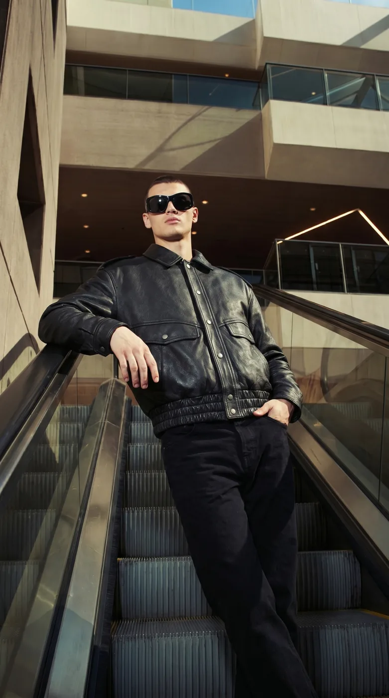 Man wearing Buneri black leather bomber jacket