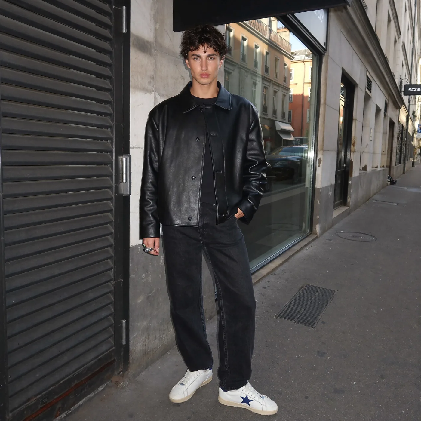 Man wearing Buneri black leather bomber jacket