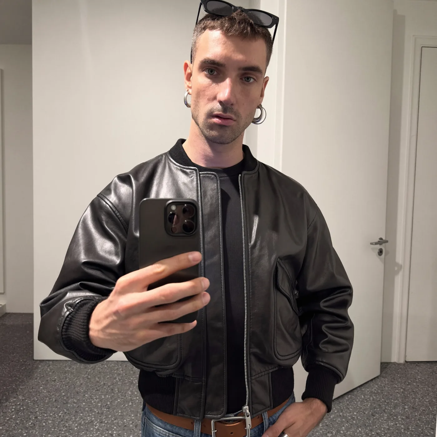 Man wearing Buneri black leather bomber jacket