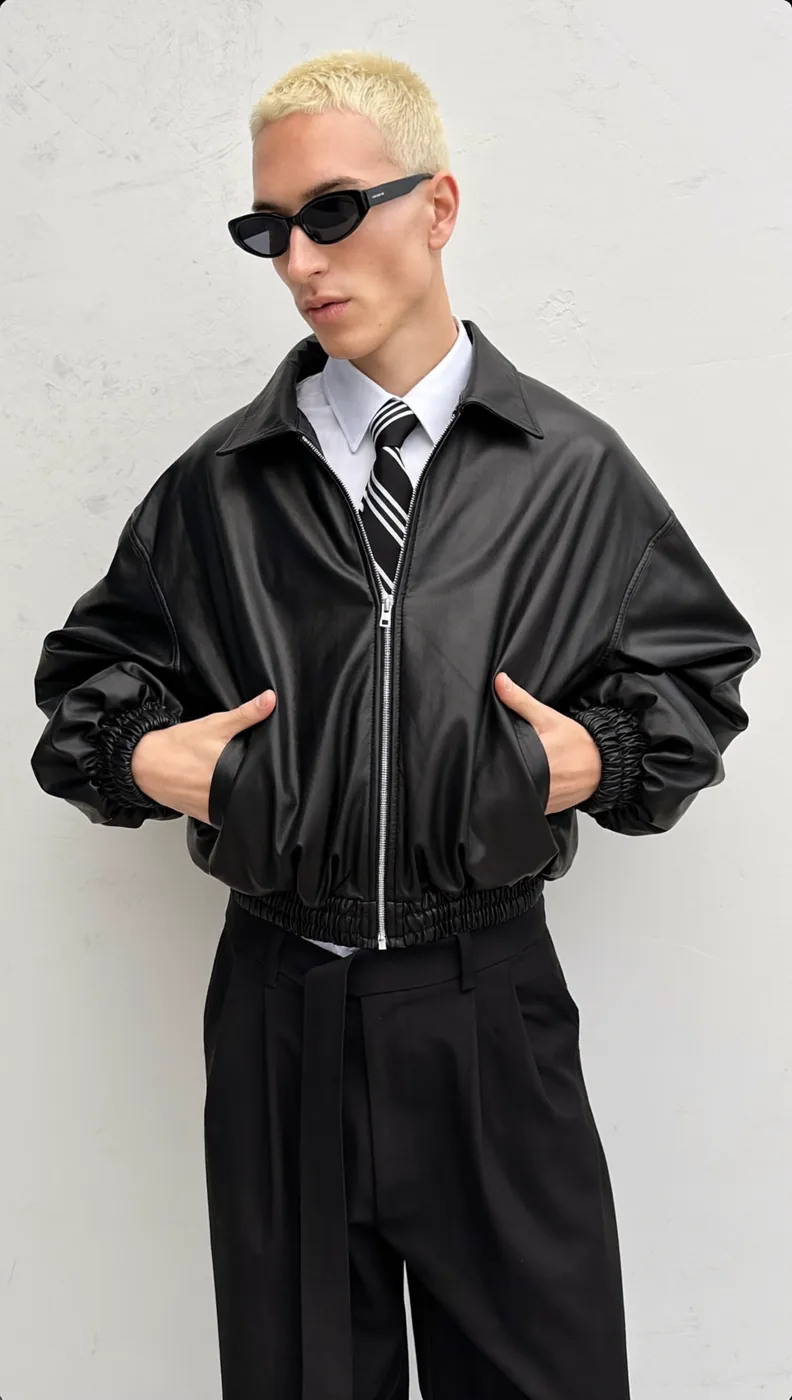 Man wearing Buneri black leather bomber jacket