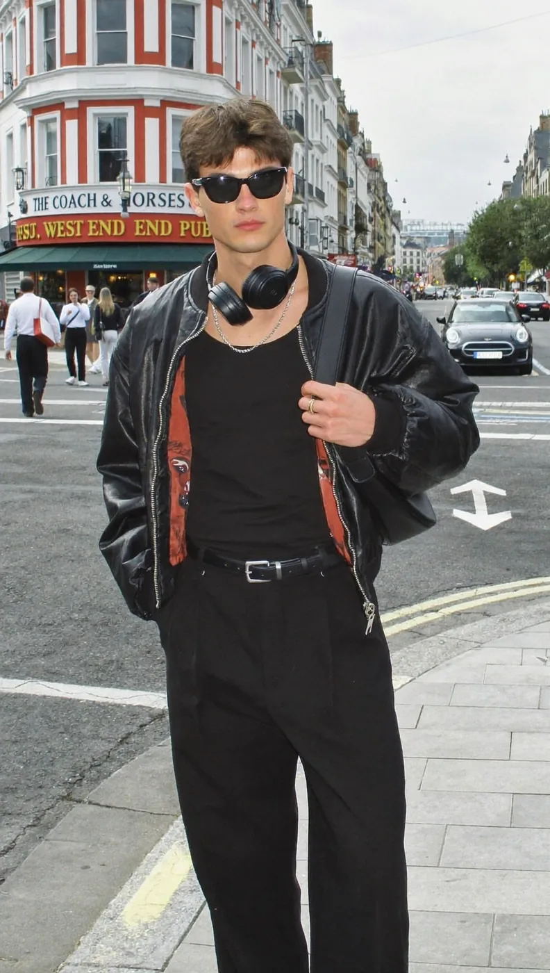Man wearing Buneri black leather bomber jacket