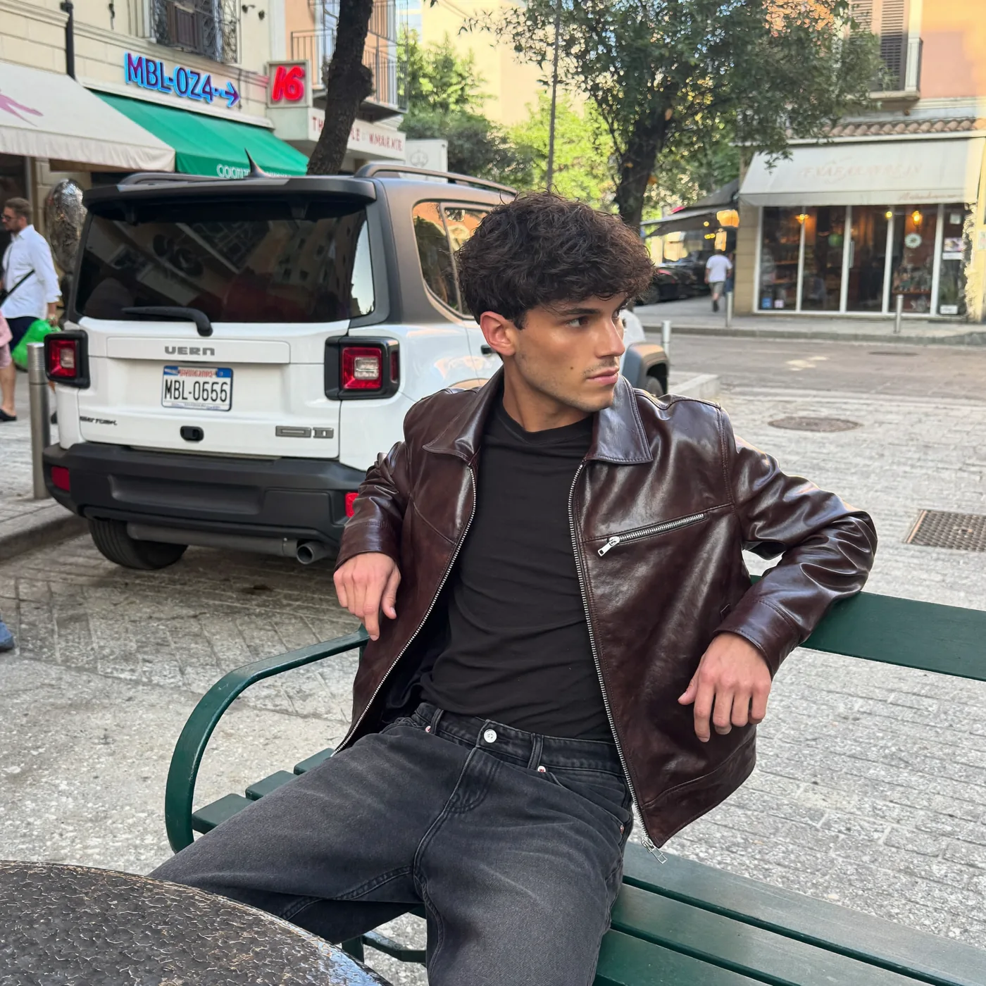Man wearing Buneri burgundy leather bomber jacket